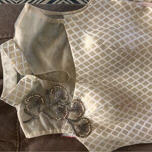 Elegant Gold and Cream Patterned Top